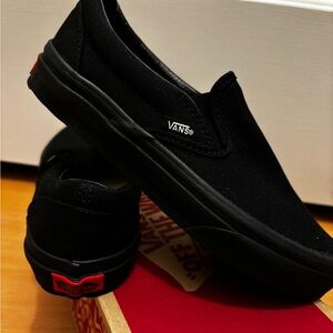 Woman’s Black Slip on Vans